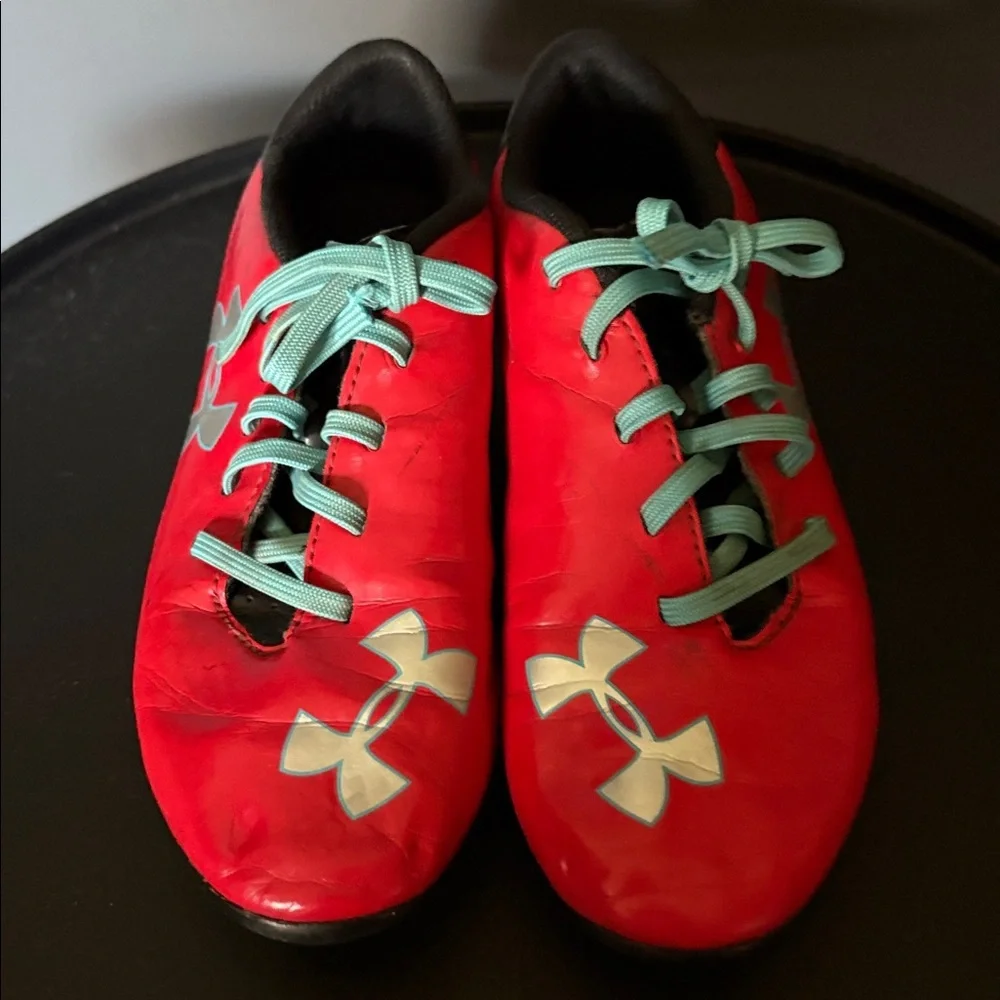 Under Armour size 1 Red and Teal Soccer Cleats